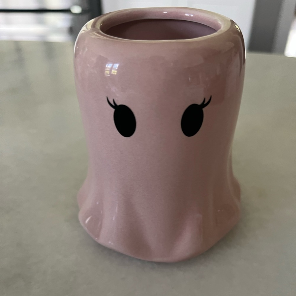 Pink ghost candle